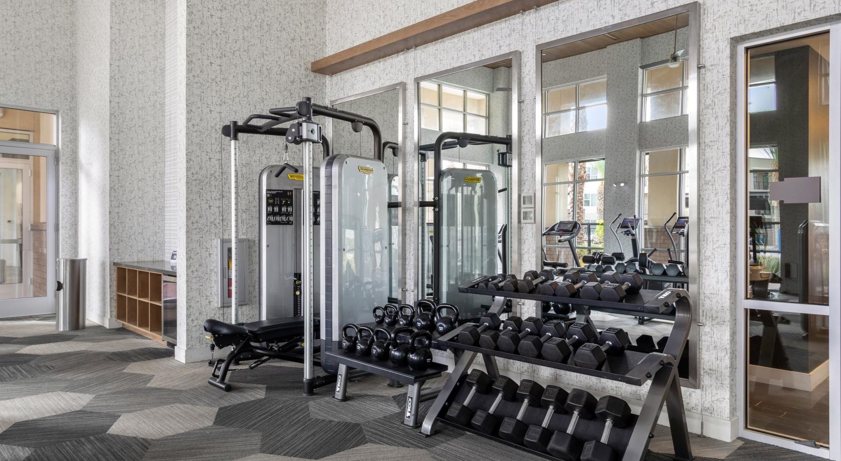 Quick access to state-of-the-art amenities a room with a large machine and a bench in it