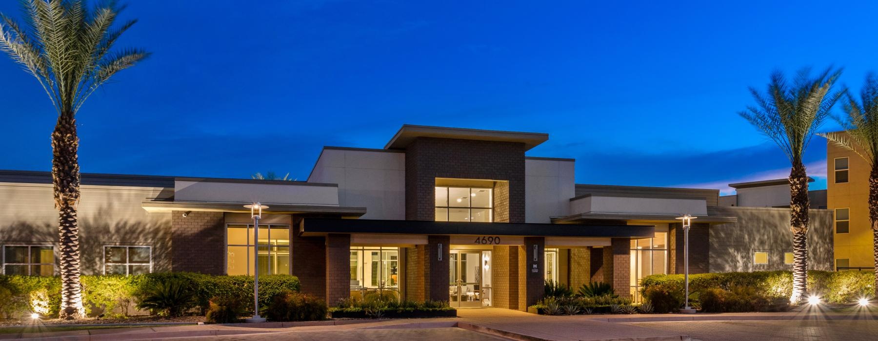 a building with trees in front of it