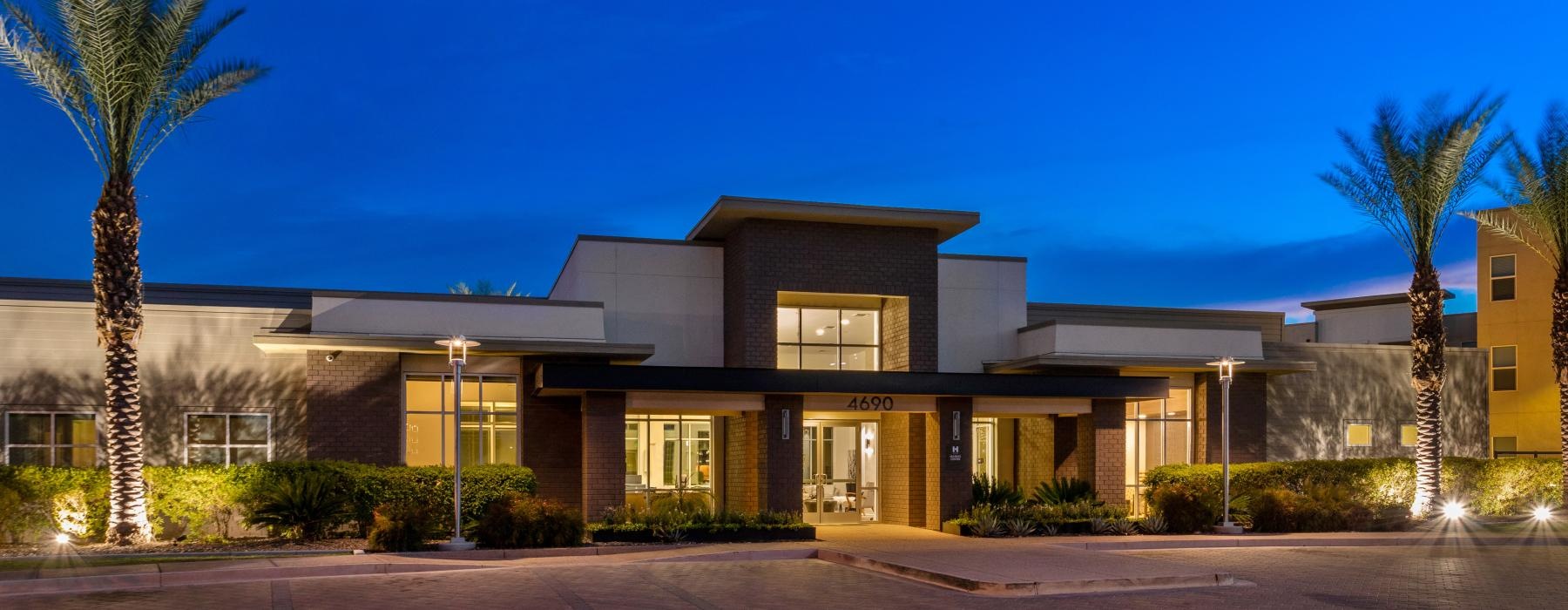 a building with trees in front of it