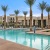 a swimming pool in front of a building