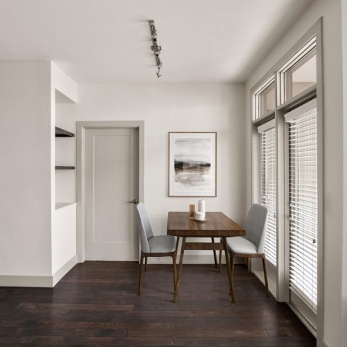 Wide open living areas perfect for entertaining a room with a table and chairs
