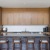 a kitchen with wooden cabinets