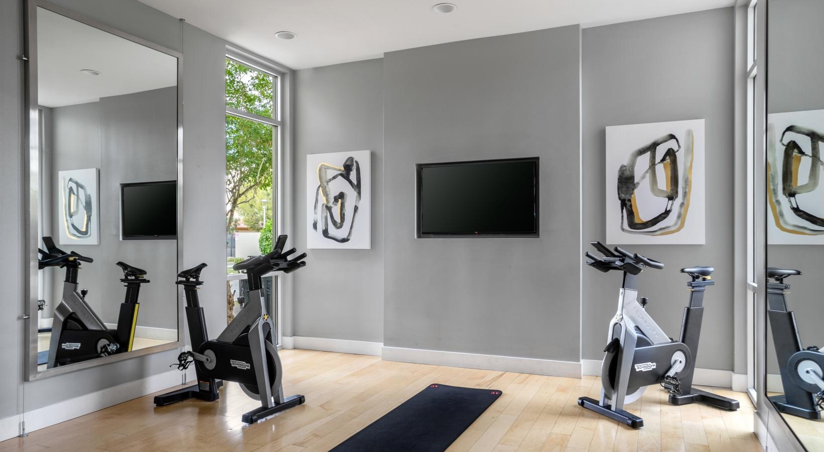 Get your workout on a room with exercise equipment